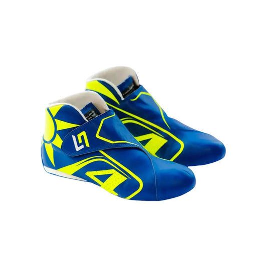 Blue and yellow Lando Norris 2023 F1 Race shoes on a white background