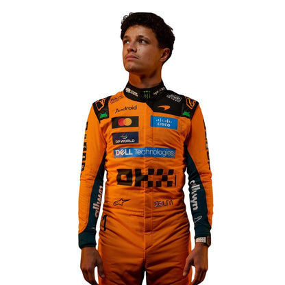 Lando Norris wearing a McLaren racing suit with various sponsor logos with Close View