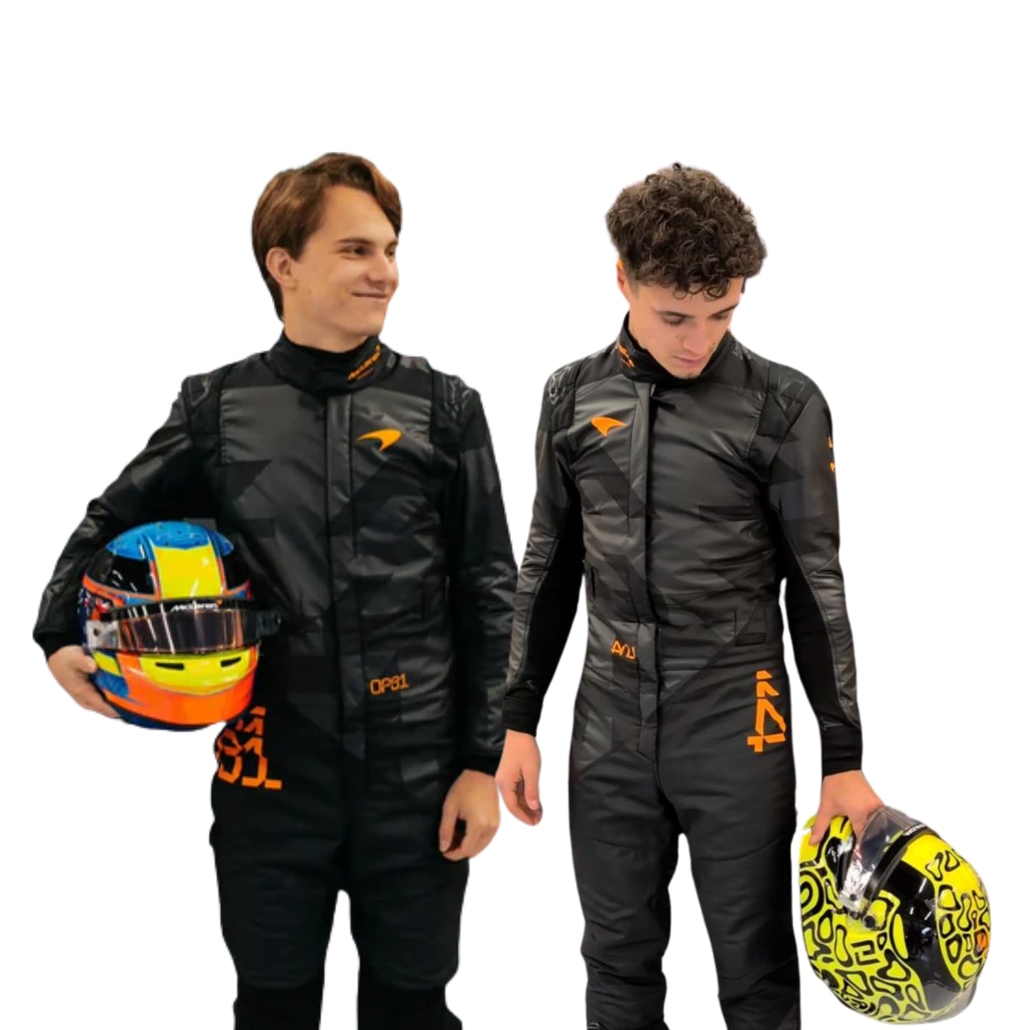 Front view of the 2025 McLaren F1 livery reveal racing costume worn by Lando Norris and Oscar Piastri, featuring a sleek matte black base with bold orange logos and driver initials (LN4 & OP81) in neon orange.