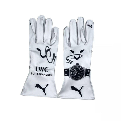 White Lewis Hamilton 2018 F1 race gloves with IWC Schaffhausen and Puma logos on a white background