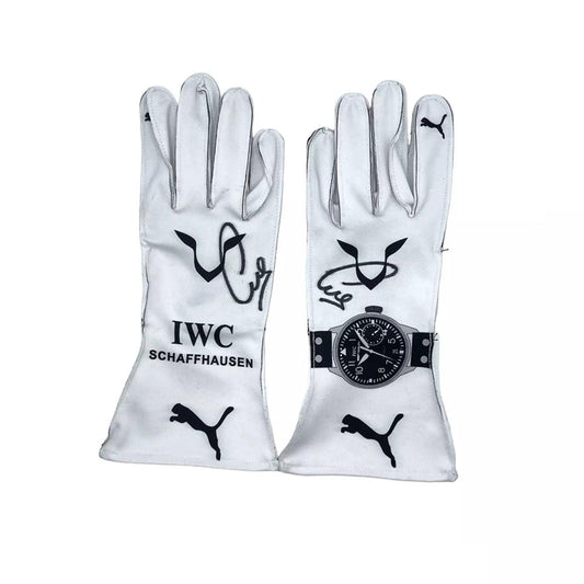 White Lewis Hamilton 2018 F1 race gloves with IWC Schaffhausen and Puma logos on a white background