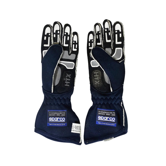 Pair of navy blue Max Chilton 2016 IndyCar race gloves with white and gray accents on a white background