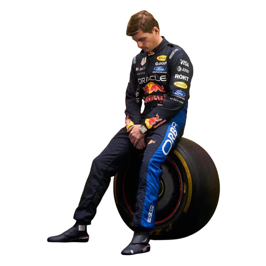 Max Verstappen wearing a Red bull racing suit with various sponsor logos with Left View