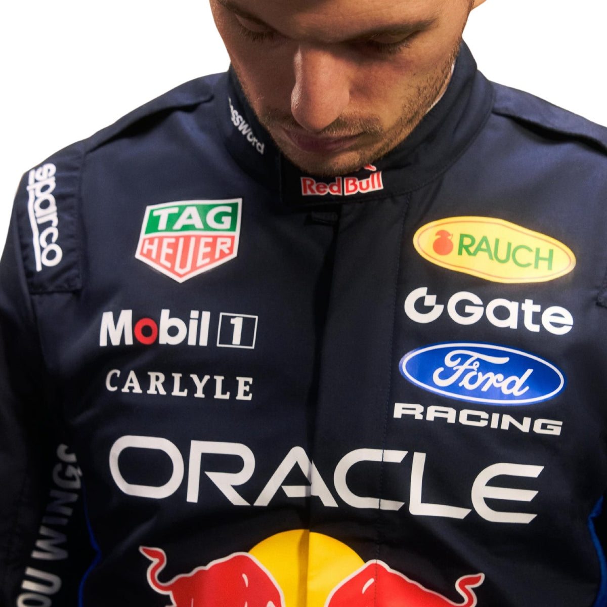 Max Verstappen wearing a Red bull racing suit with various sponsor logos with Close View