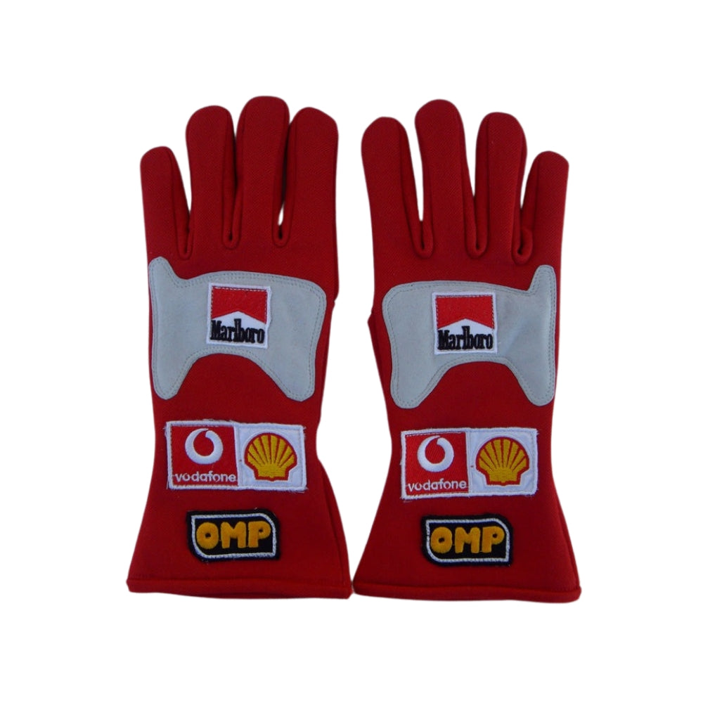 Red Michael Schumacher 2006 F1 Race gloves with multiple brand logos on a white background