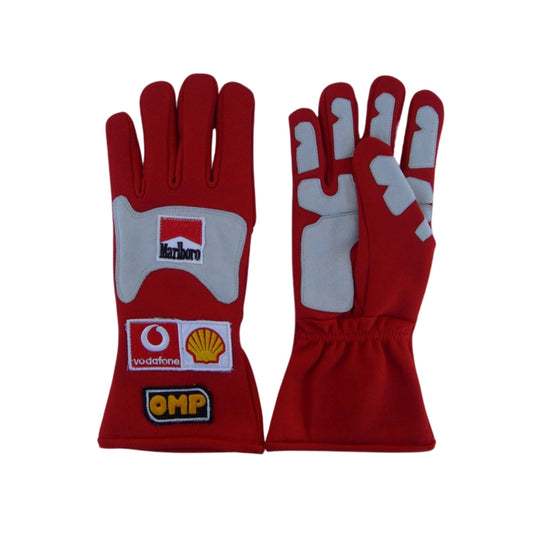 Red Michael Schumacher 2006 F1 Race gloves with sponsor logos on a white background
