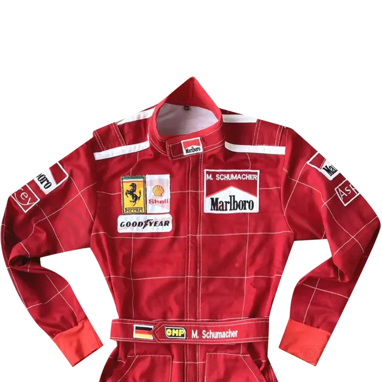 Close-up of Schumacher’s 1996 F1 suit, featuring the detailed stitching, Ferrari red color, and early sponsor branding from his debut season