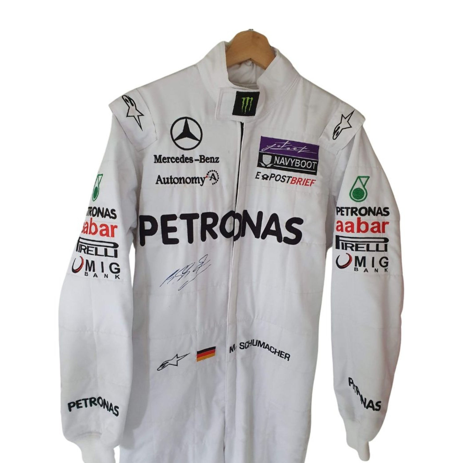 Close-up of chest and collar section on Schumacher’s 2011 F1 suit, highlighting intricate embroidery and authentic sponsor design.