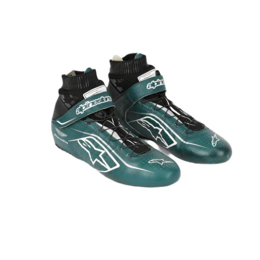 Pair of green Nico Hülkenberg 2022 F1 race shoes with black accents on a white background