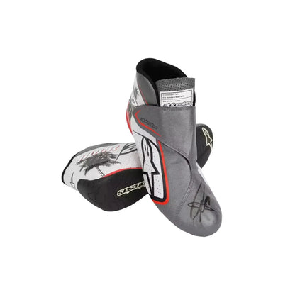 Pair of gray and black protective Nico Hülkenberg 2023 Miami GP Weekend Worn F1 Racing boots on a white background