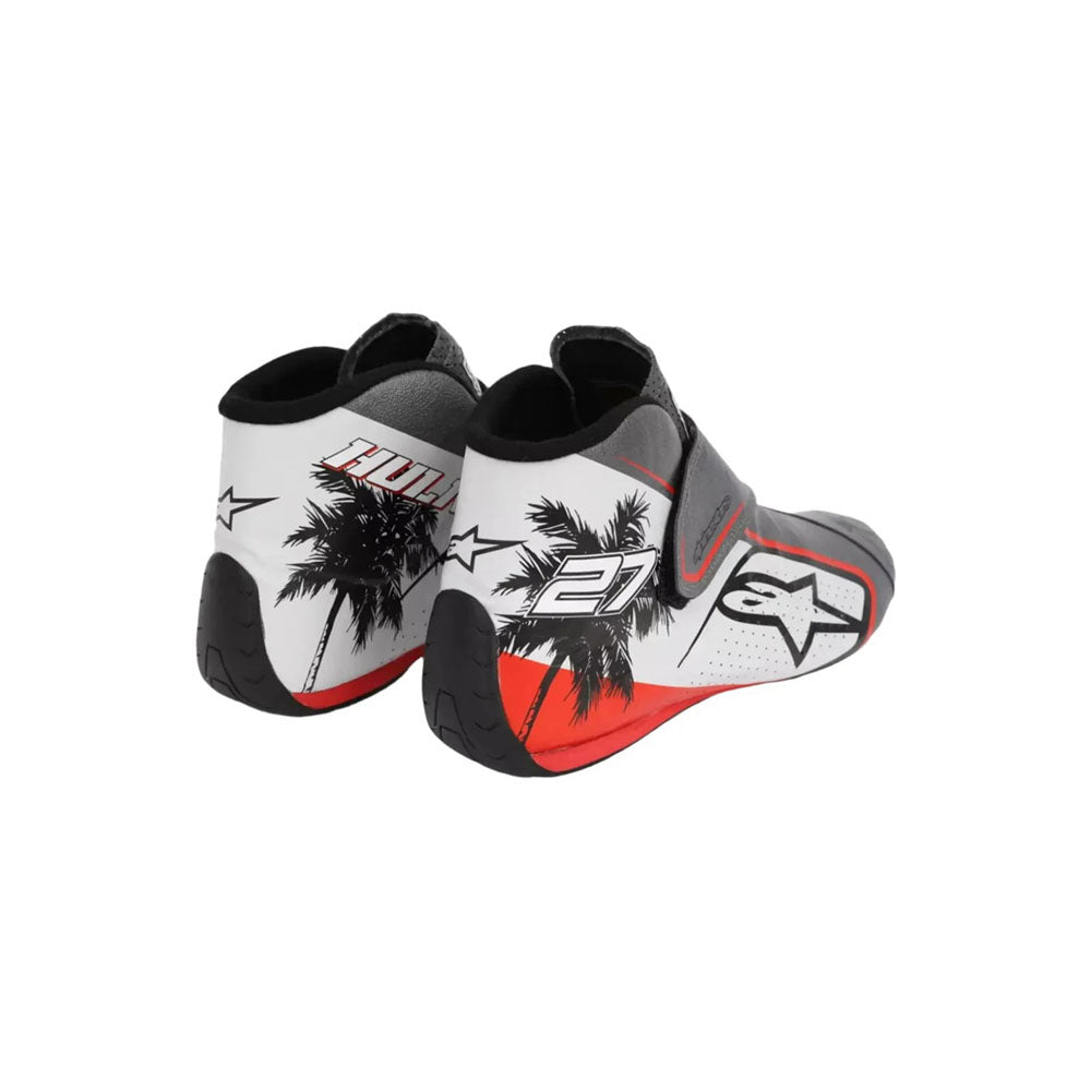 Pair of black and white Nico Hülkenberg 2023 Miami GP Weekend Worn F1 Racing boots with palm tree design on a white background