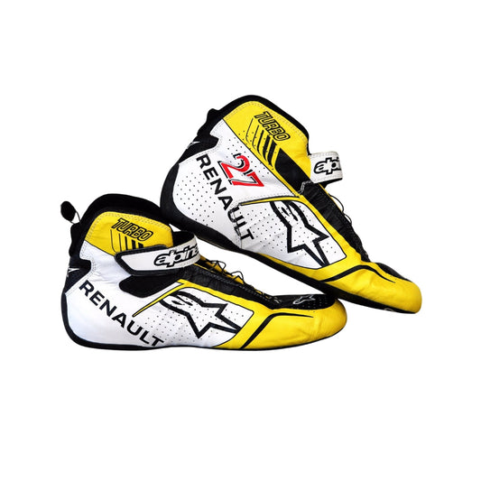 Pair of Nico Hülkenberg French GP Renault F1 racing boots with yellow and white design on a white background