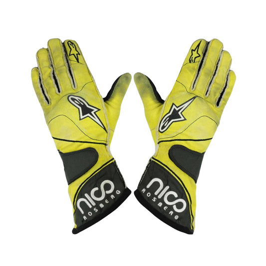 Pair of yellow Nico Rosberg 2011 F1 race gloves with black accents and visible branding on a white background