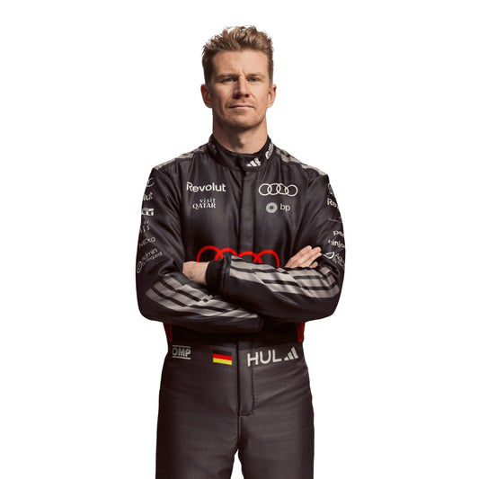 Nico Hulkenberg wearing a Audi racing suit with various sponsor logos with Close View