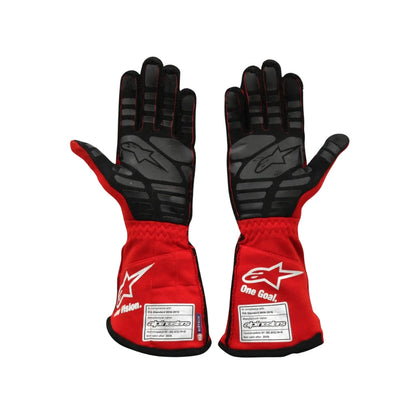 Red and black Nikita Mazepin 2021 Mexico GP F1 race gloves with visible branding on a white background