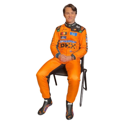 Oscar Piastri wearing a McLaren racing suit with various sponsor logos with Front View