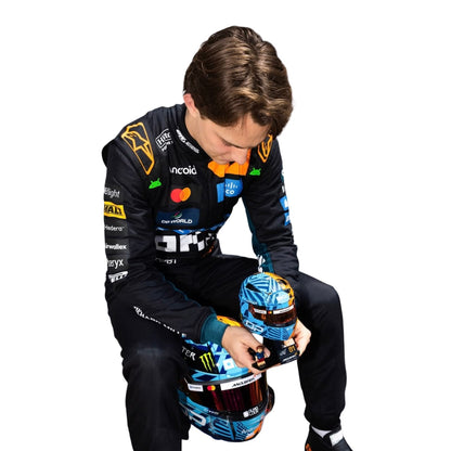 Oscar Piastri wearing a McLaren Monaco GP racing suit with various sponsor logos with Close View
