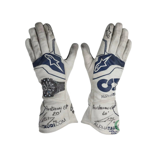 Pair of white and blue Pierre Gasly 2020 F1 race gloves with branding on a white background