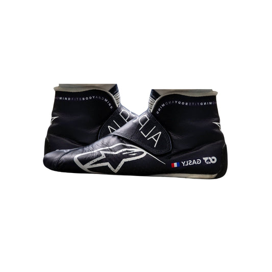 Black and gray Pierre Gasly 2022 F1 Race shoes with branding on a white background