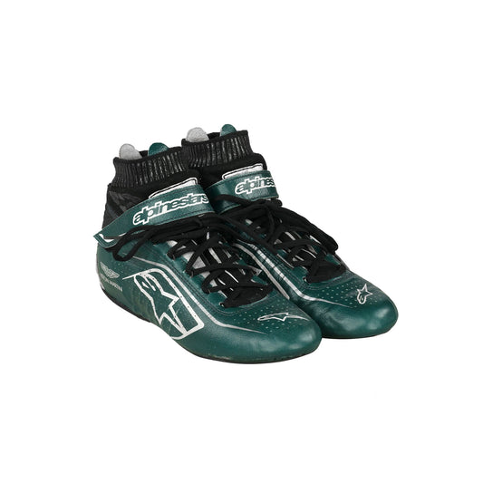 Green and black Sebastian Vettel 2022 F1 Race shoes with 'Alpinestars' branding on a white background