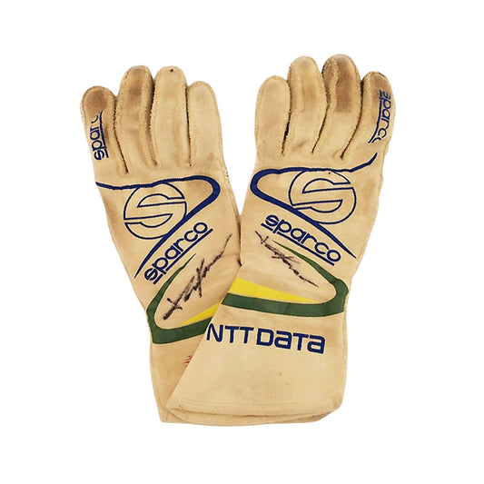 Pair of Sparco Tony Kanaan 2017 IndyCar race gloves with NTT DATA branding on a white background