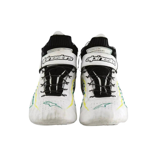 Pair of white Tony Kanaan Indy 500 2022 Chip Ganassi Race shoes with black and green accents on a white background