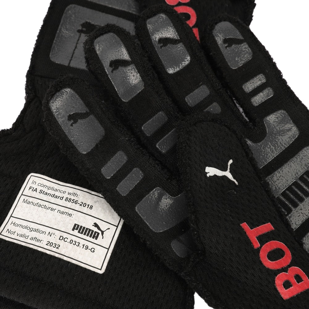 Black Valtteri Bottas 2022 British GP F1 Race gloves with Puma logo and branding on a white background