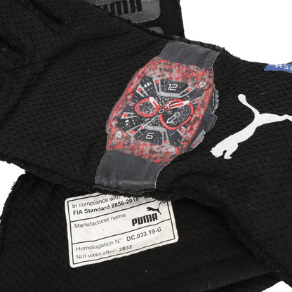 Black Valtteri Bottas 2022 British GP F1 Race glove with a red and black watch design and Puma branding.