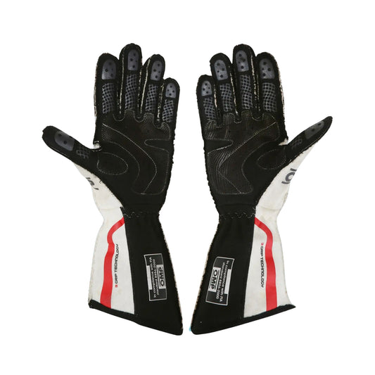 Pair of black and white Will Power 2012 IndyCar 500 race gloves with red accents on a white background