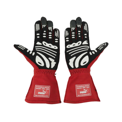 Pair of red and black Will Power 2020 IndyCar race gloves with Puma branding on a white background