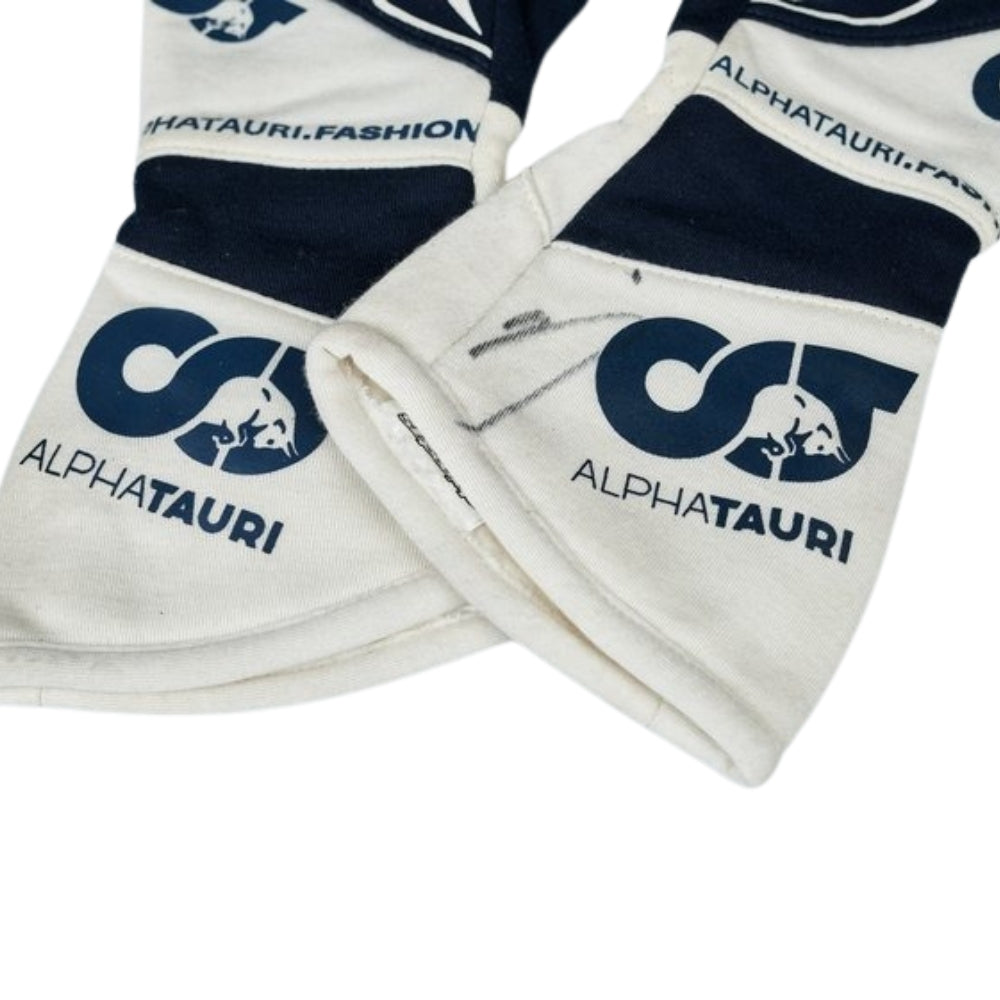 White and navy Yuki Tsunoda 2022 F1 Race gloves with AlphaTauri logo on a white background