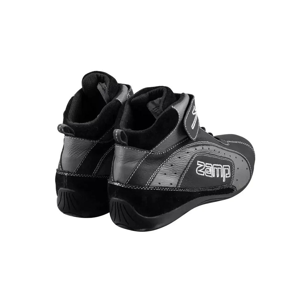 Black and gray ZK-20 Kart Racing shoes with 'Zamp' branding on a white background
