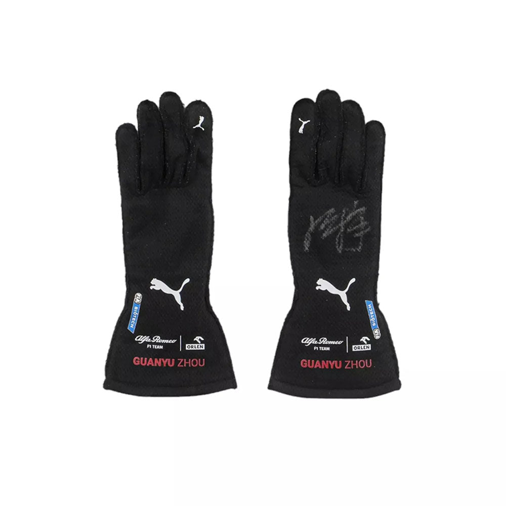 Pair of black Zhou Guanyu 2022 Singapore GP F1 Race gloves with branding and text on a white background